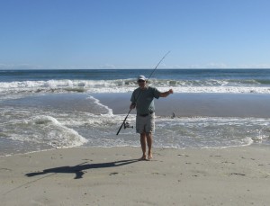 Surf fisher with fish
