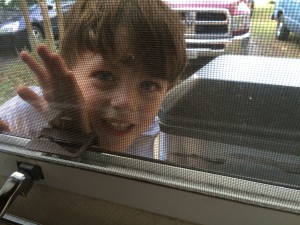 Elijah helping me latch the window