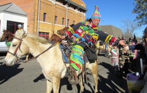 Riders slapping hands