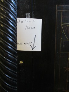 Safe with bullet hole marked