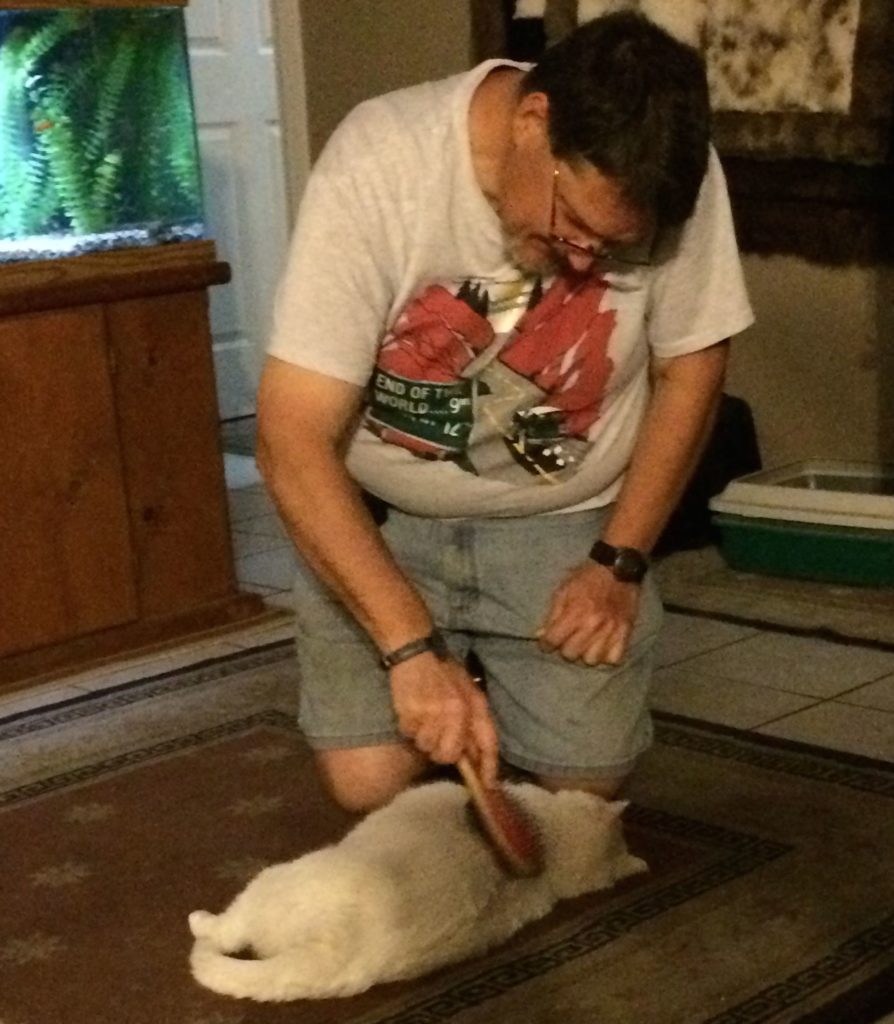 Jim giving Cora the brush