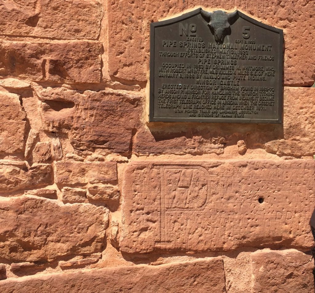 Pipe Spring National Monument sign with grafitti