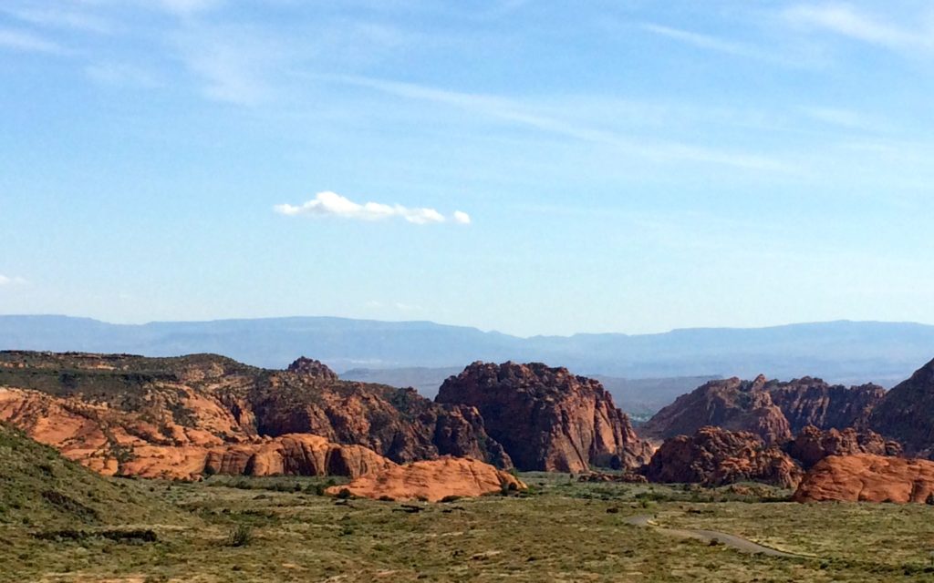 redhills rising out of green