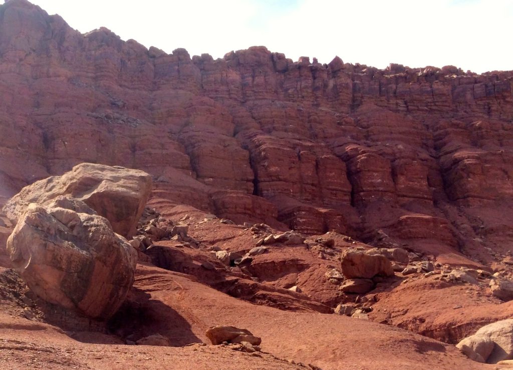 Cliff behind the blanaced rocks