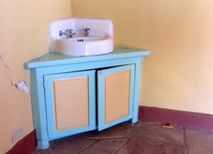 Sink in guest room with mouse trap