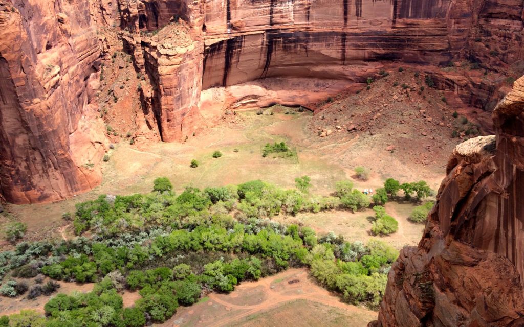 Slidng house ruins with valley