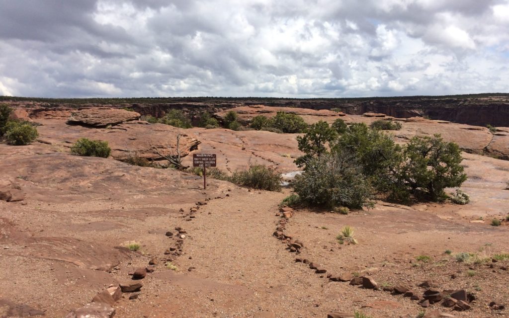 Trail with warning sign