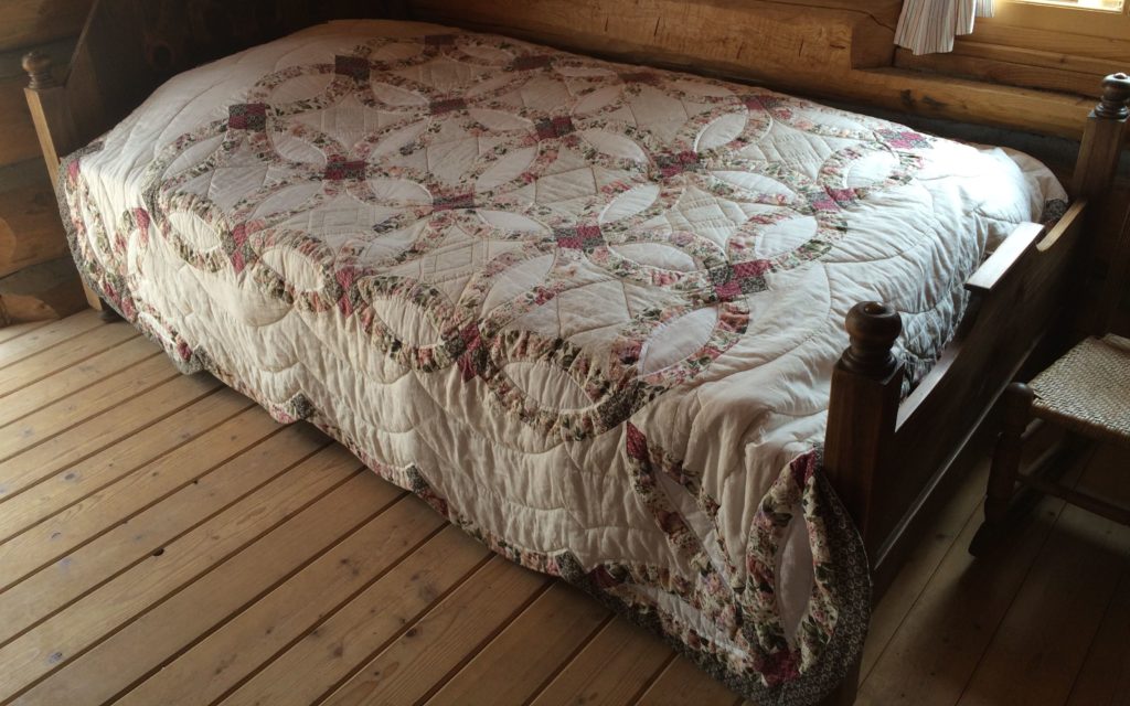 bed with my quilt