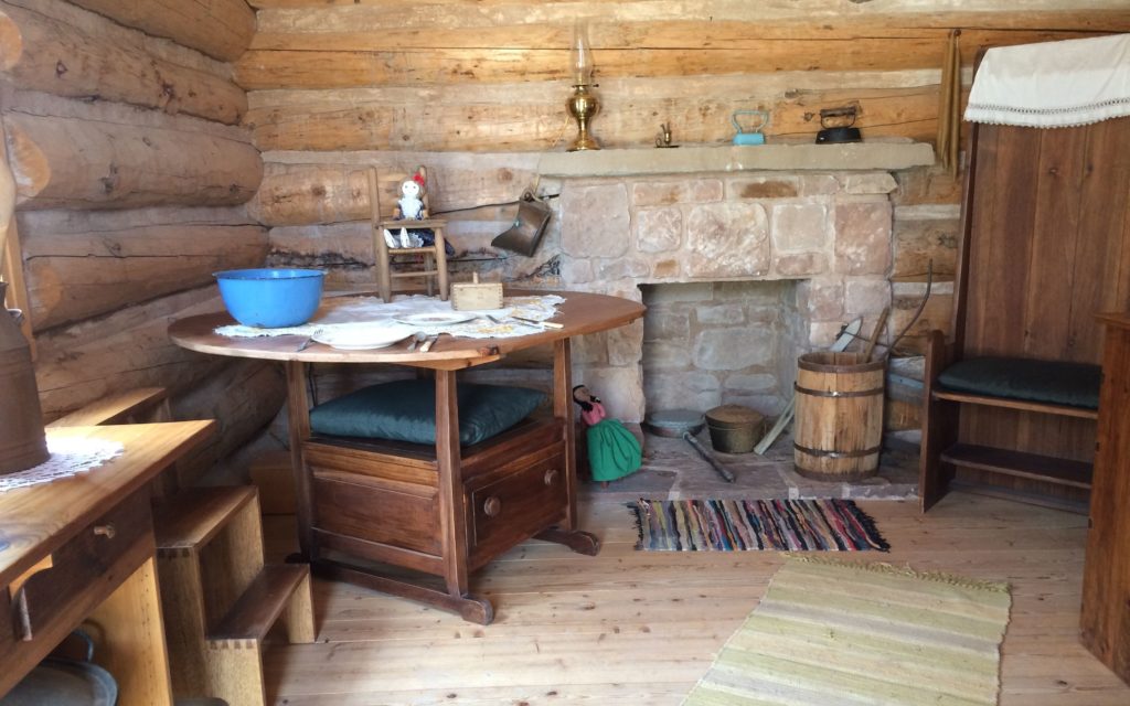 cabin with interesting storage in table