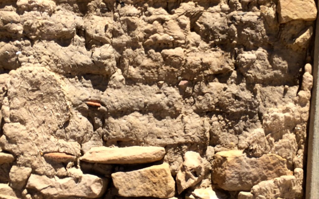 close up of adobe with inclusions