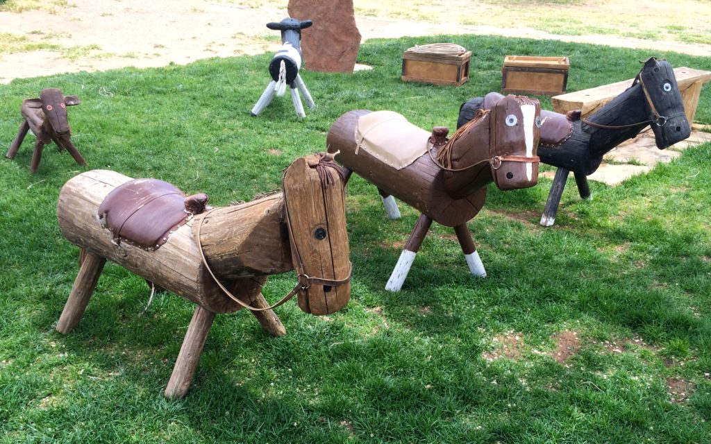 horses, a cow and a sheep