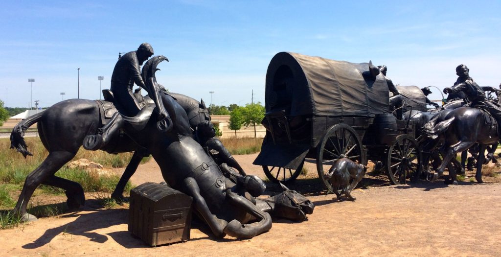 Horse falling over trunk