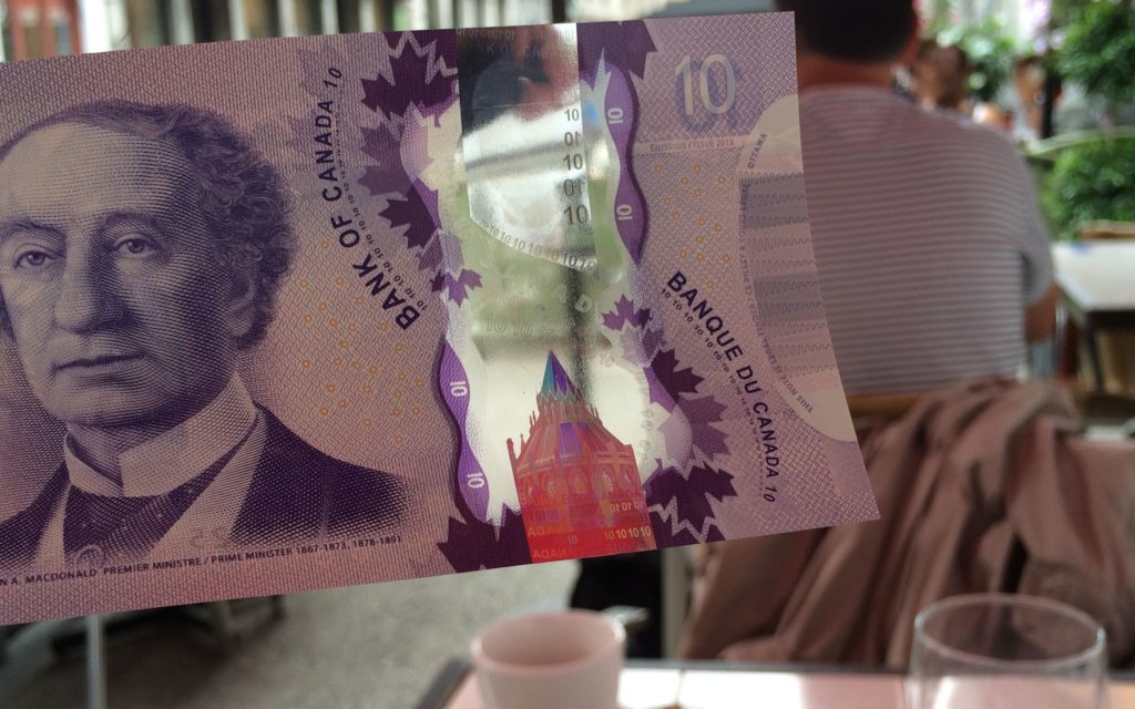 new Canadian money with a clear strip