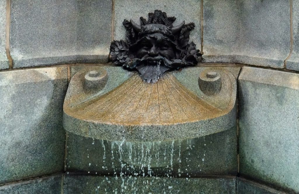 spitting water in the fountain