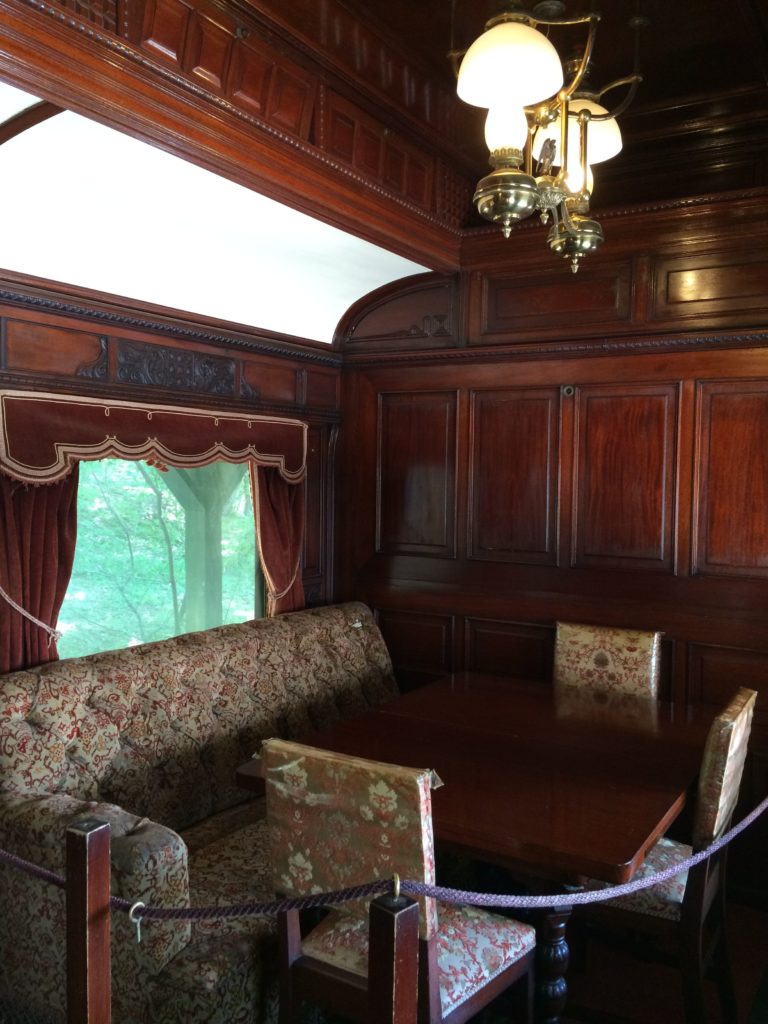 table and cahirs in rail car